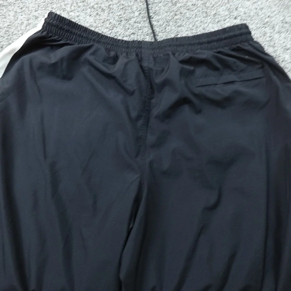 NEW Nike Pants Mens 2XL Black Baggy Swoosh Drawstring Windbreaker Track Workout